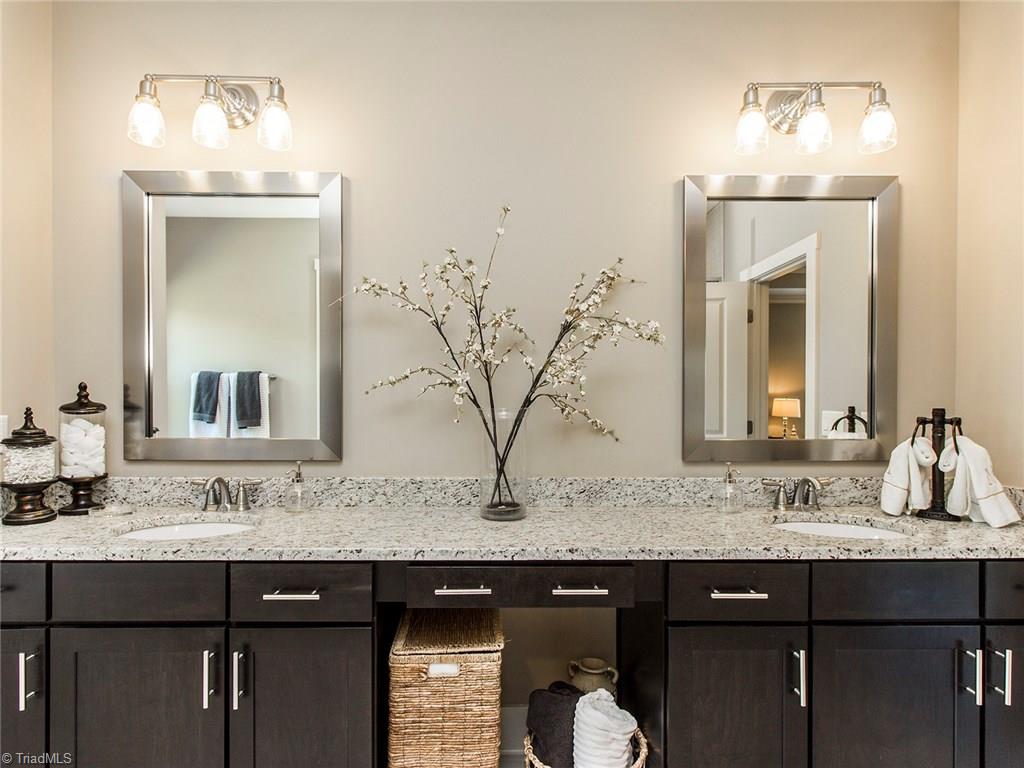 6807 Koala Drive Oak Ridge, NC 27310 - Photo 19 of 28 Master bathroom. Every upgrade. Every nook and cranny and plenty of room to relax.