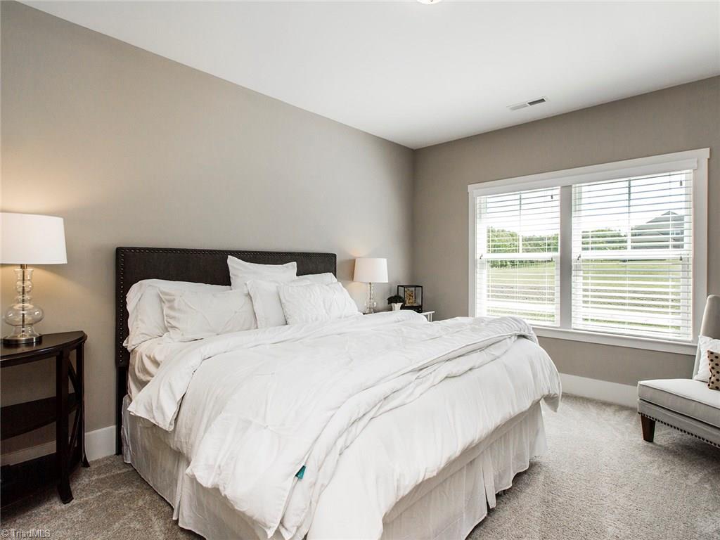 6807 Koala Drive Oak Ridge, NC 27310 - Photo 22 of 28 Second bedroom is larger and more luxurious than many master bedrooms.