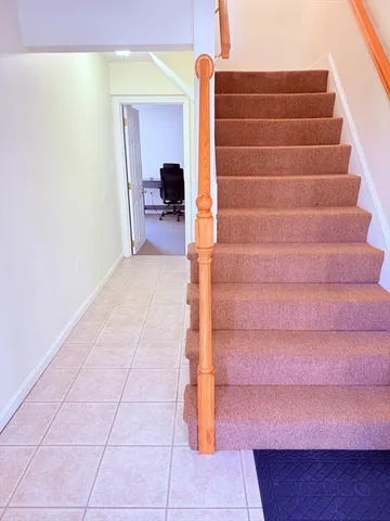 a view of entryway with stairs