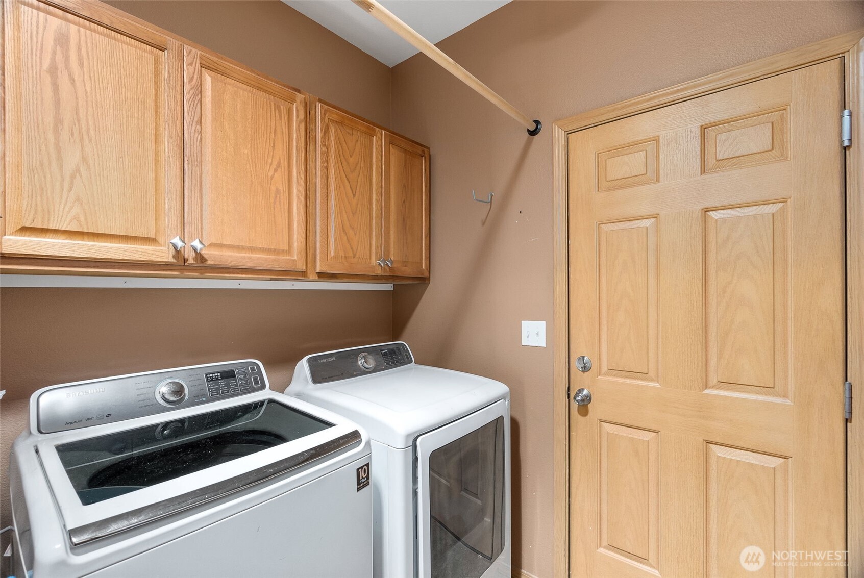 8650 Bainbridge Loop Northeast Lacey, WA 98516 - Photo 24 of 34 a utility room with dryer and washer