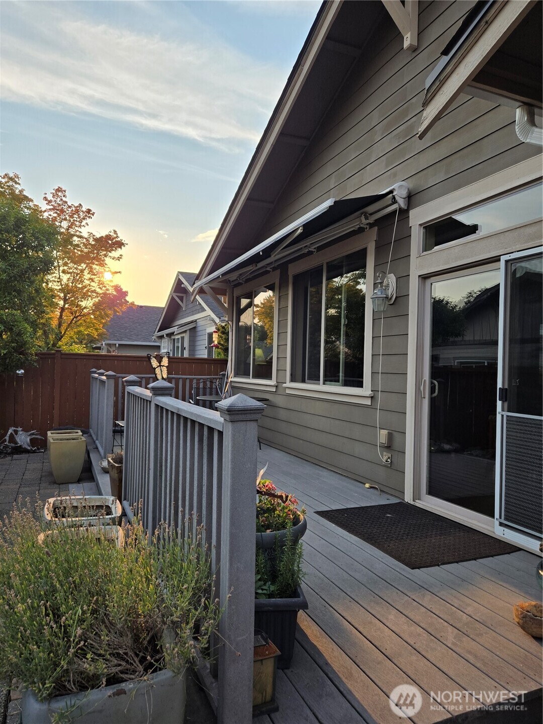 8650 Bainbridge Loop Northeast Lacey, WA 98516 - Photo 28 of 34 a view of a house with backyard and sitting area