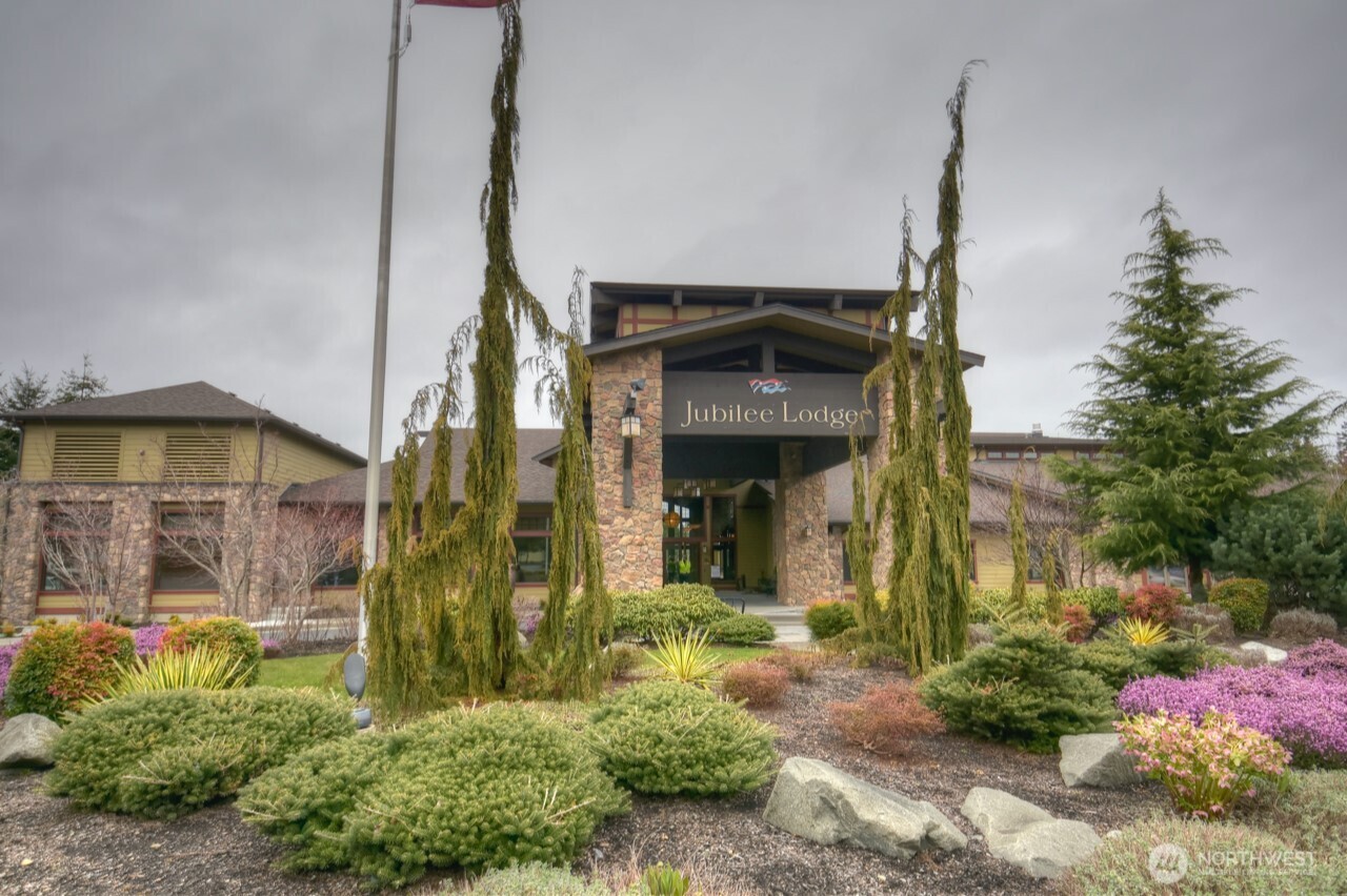 8650 Bainbridge Loop Northeast Lacey, WA 98516 - Photo 32 of 34 a front view of a house with garden