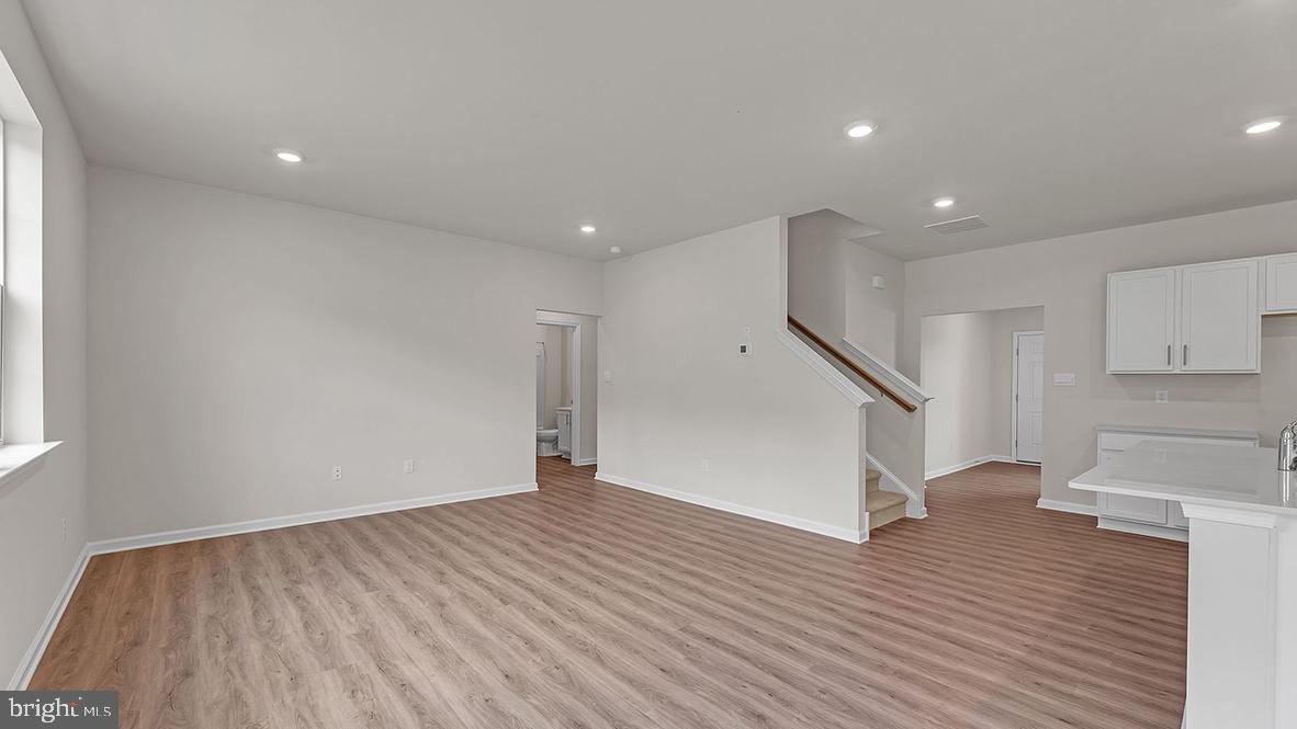 155 Littleworth Road Manahawkin, NJ 08050 - Photo 14 of 32 a view of empty room with wooden floor