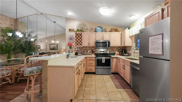 $345,000 | 611 Lazy Days Road, Unit W 11, Osage Beach, MO 65065