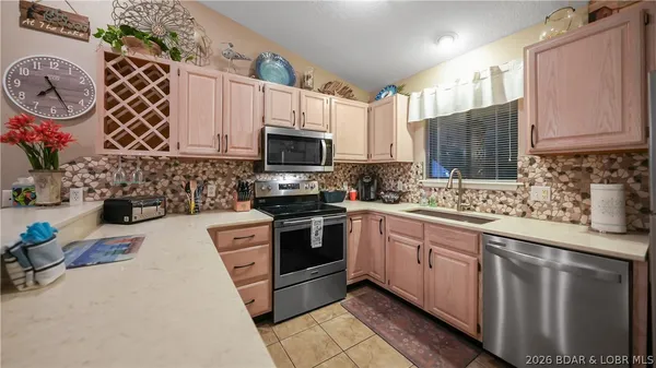 $345,000 | 611 Lazy Days Road, Unit W 11, Osage Beach, MO 65065