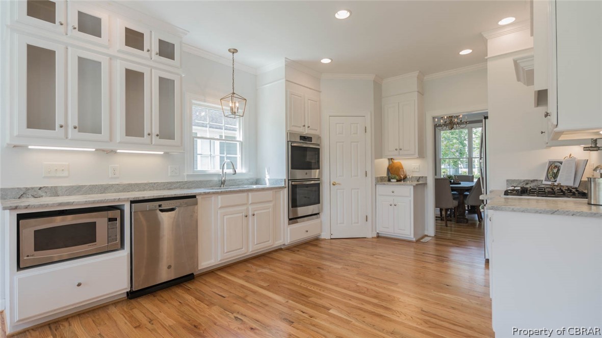3124 Ridge Drive Toano, VA 23168 - Photo 25 of 50 New custom kitchen with GE Pro appliances & upgraded leathered granite countertops.