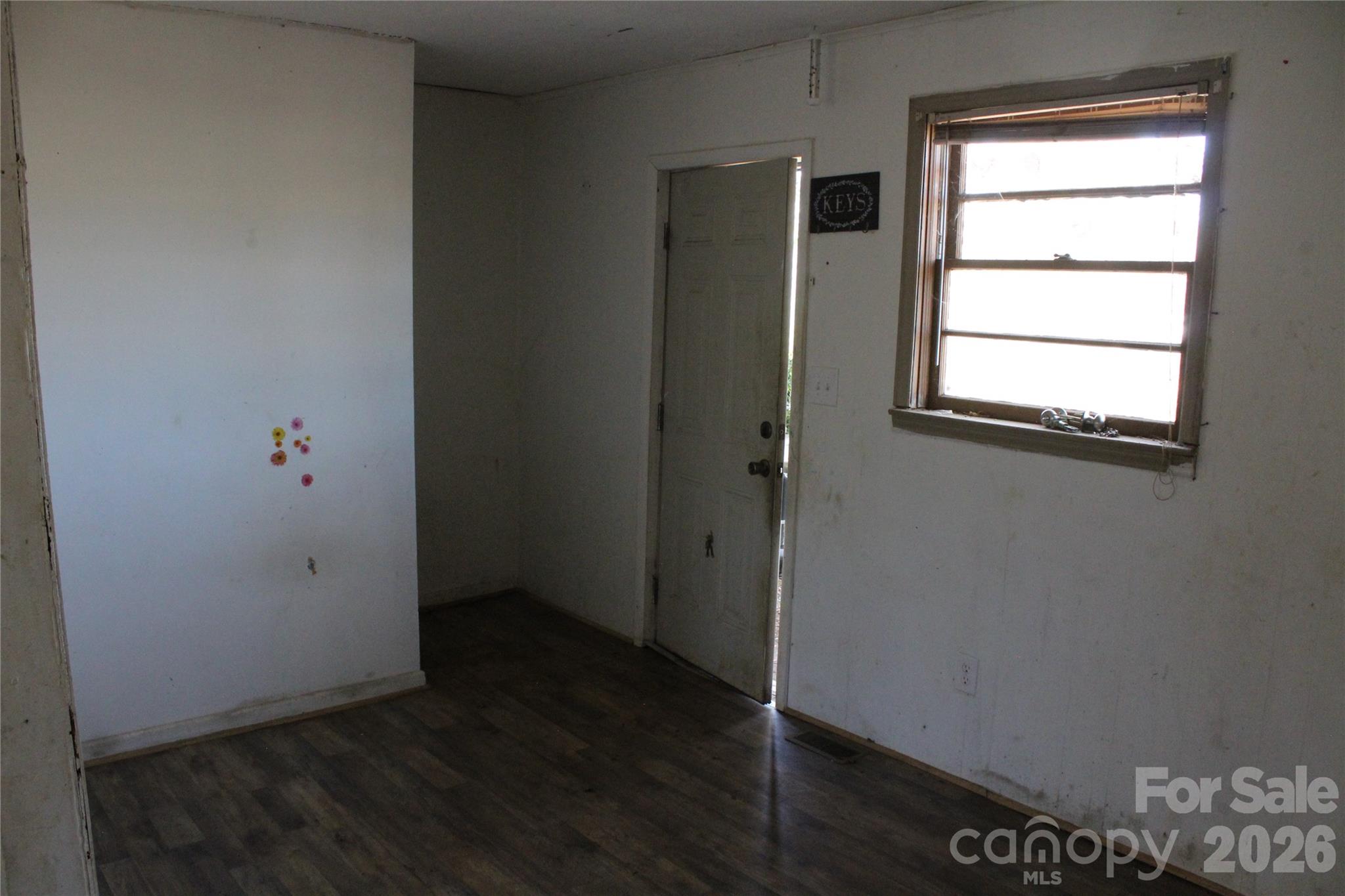 1617 Red Road Shelby, NC 28152 - Photo 11 of 21 an empty room with wooden floor and windows