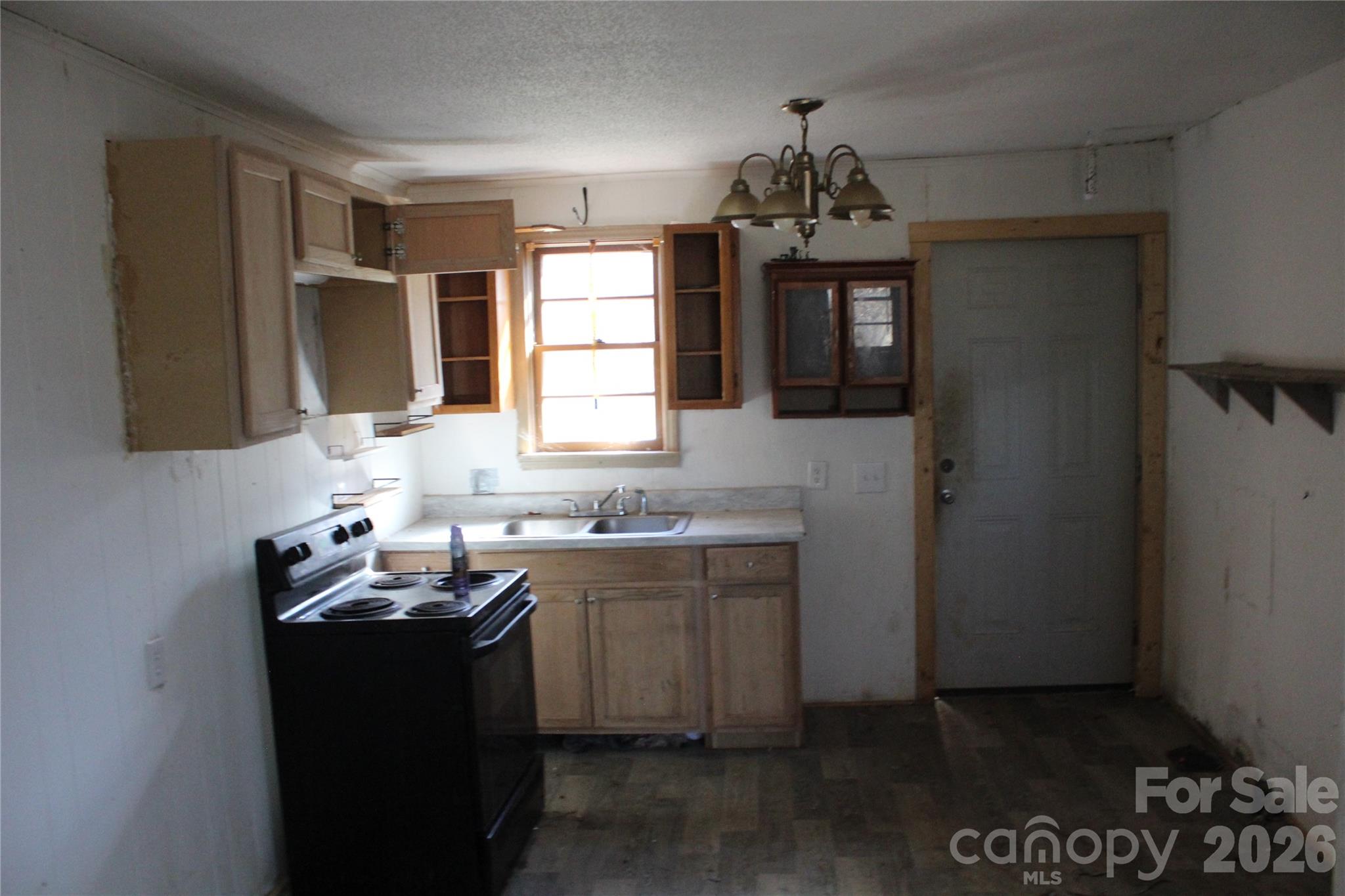 1617 Red Road Shelby, NC 28152 - Photo 14 of 21 a kitchen with a sink stove and refrigerator