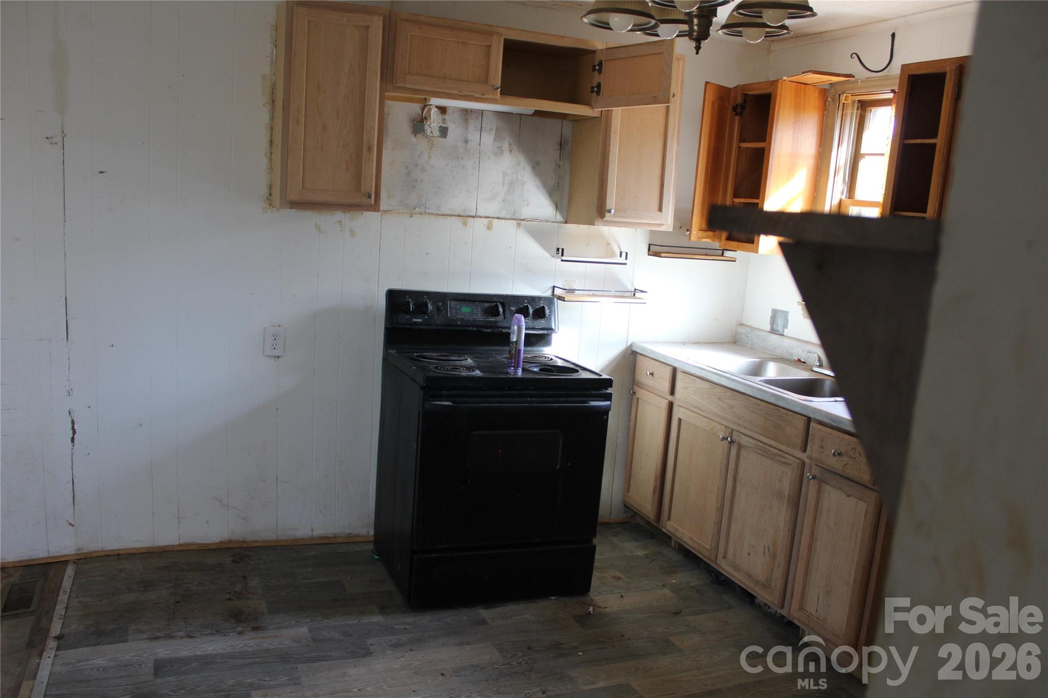 1617 Red Road Shelby, NC 28152 - Photo 15 of 21 a kitchen with a sink and a stove