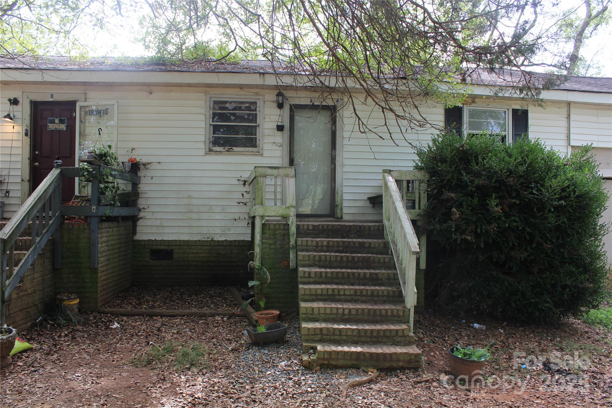 1617 Red Road Shelby, NC 28152 - Photo 2 of 9 a view of a house with backyard and trees