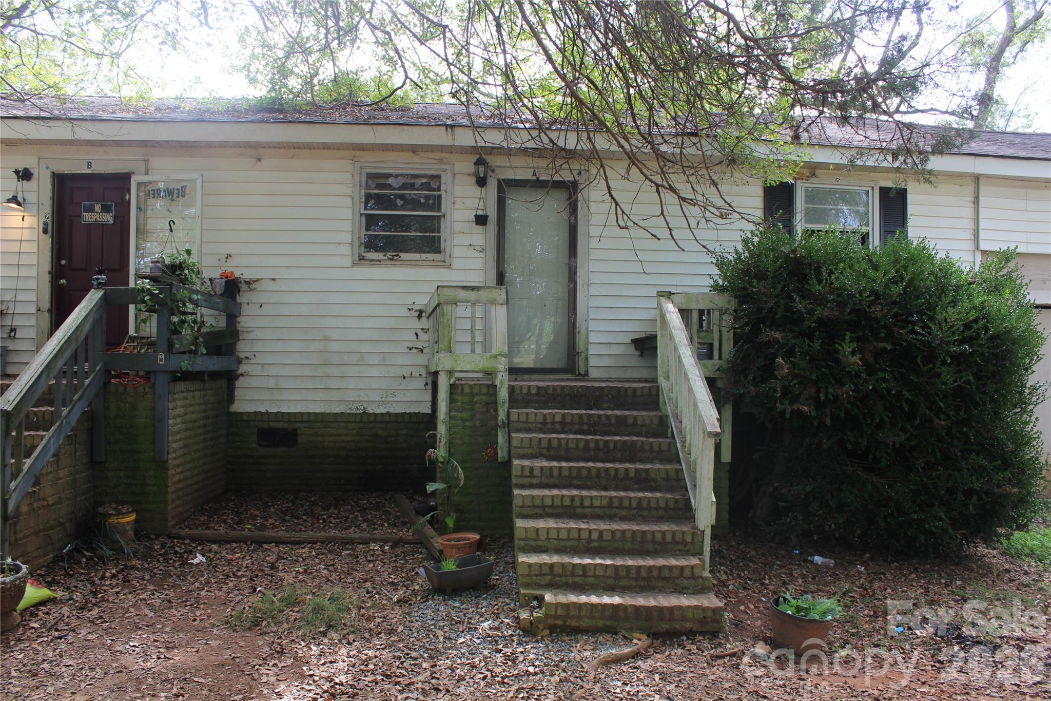 1617 Red Road Shelby, NC 28152 - Photo 2 of 21 a view of a house with backyard and trees