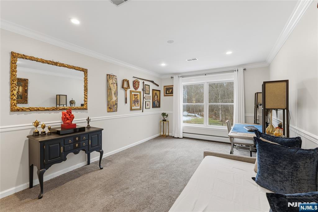 73 Big Piece Road Fairfield, NJ 07004 - Photo 24 of 45 a living room with furniture and a window