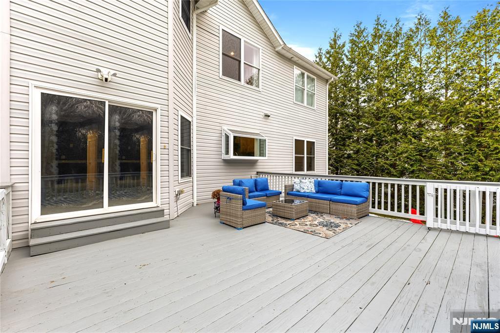 73 Big Piece Road Fairfield, NJ 07004 - Photo 34 of 45 a view of a two chairs in the roof deck