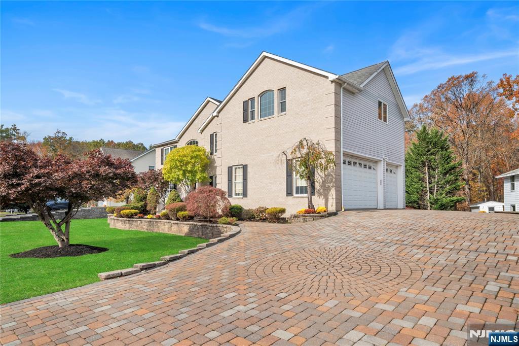 73 Big Piece Road Fairfield, NJ 07004 - Photo 43 of 45 a view of a house with a yard