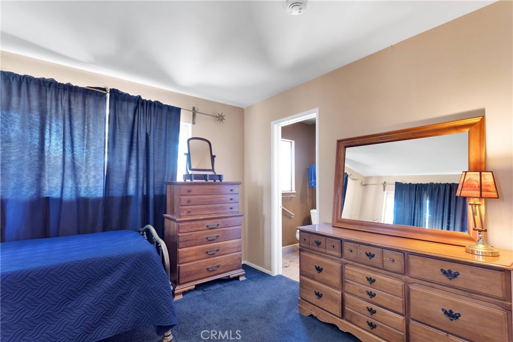 19955 Chickasaw Road Apple Valley, CA 92307 - Photo 29 of 60 a view of room with furniture and a window