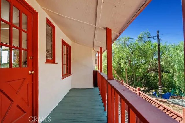 a balcony with an outdoor view