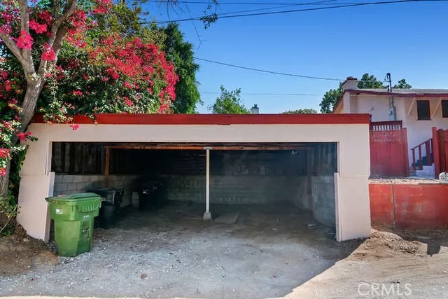front view of a house with a street