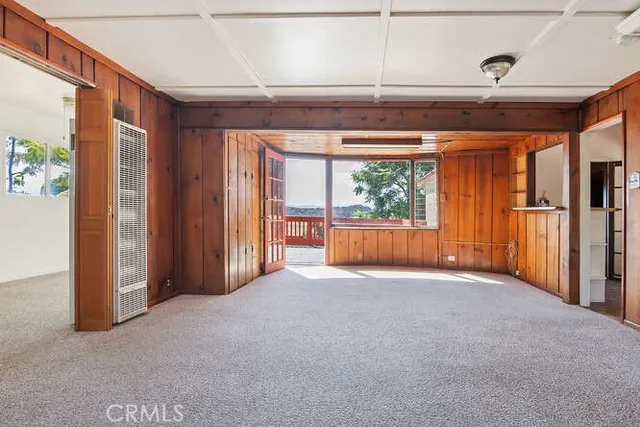 a bathroom with a sink a toilet and a window