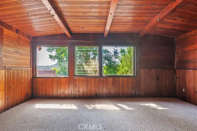 a view of a backyard of the house