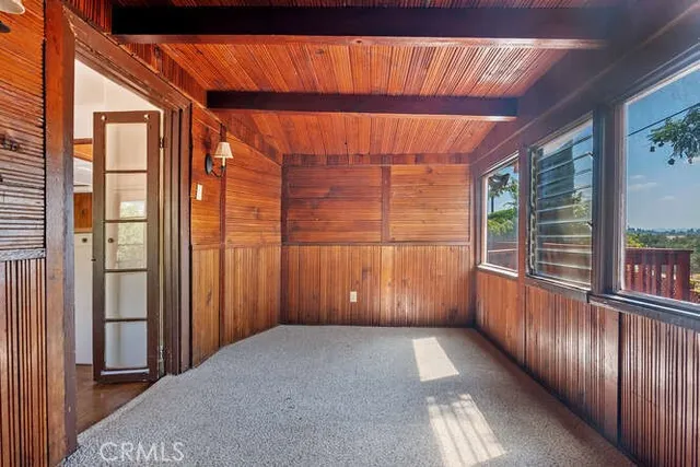 a open kitchen with cabinets a sink and appliances
