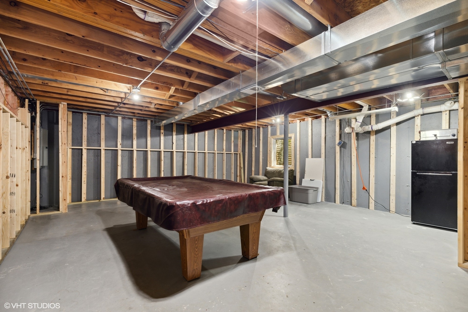 4407 Maple Leaf Drive Johnsburg, IL 60051 - Photo 15 of 17 a bath room with a bed and a table