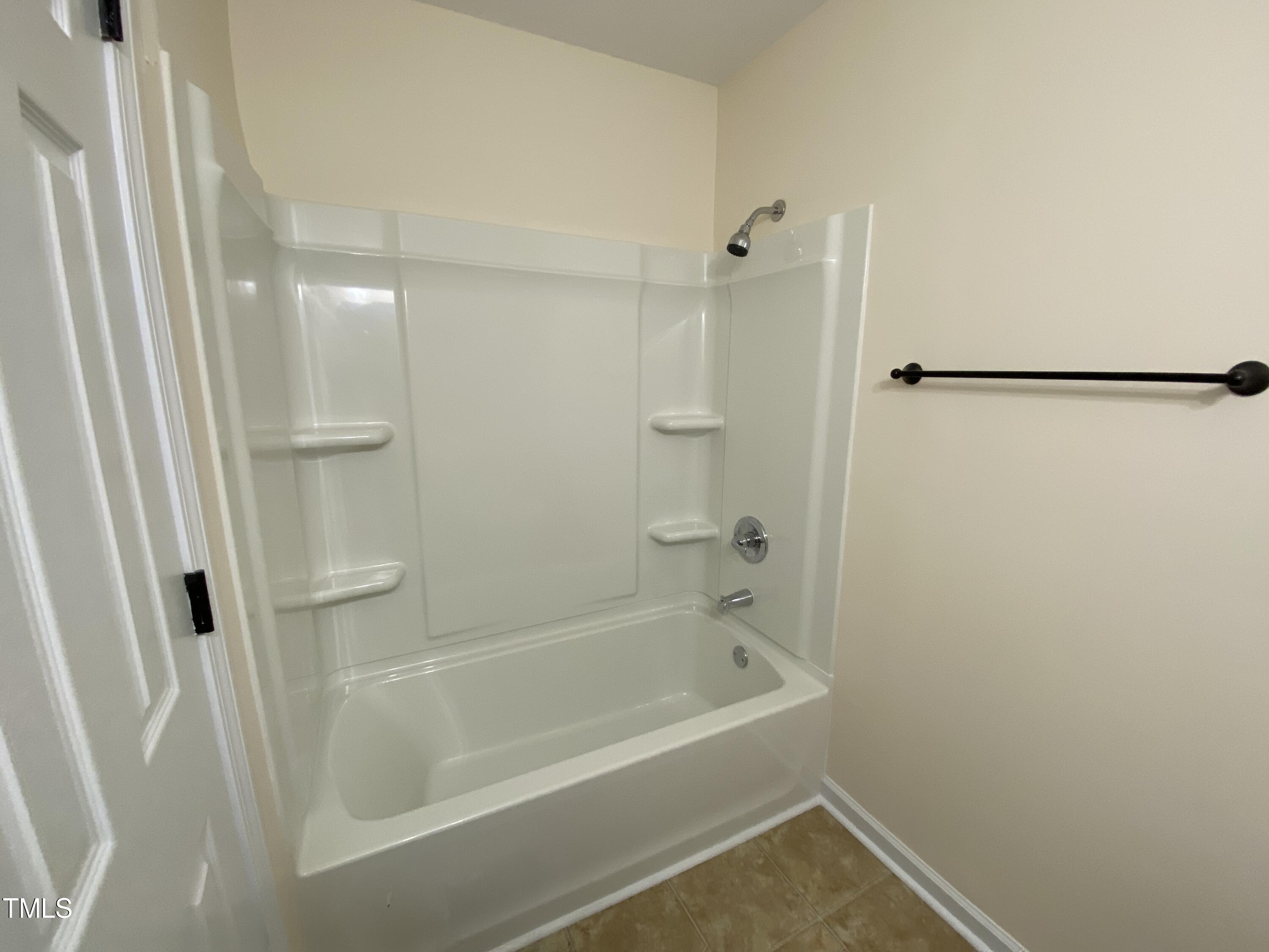 110 Sycamore Street Dunn, NC 28334 - Photo 13 of 28 a bathroom with a bathtub