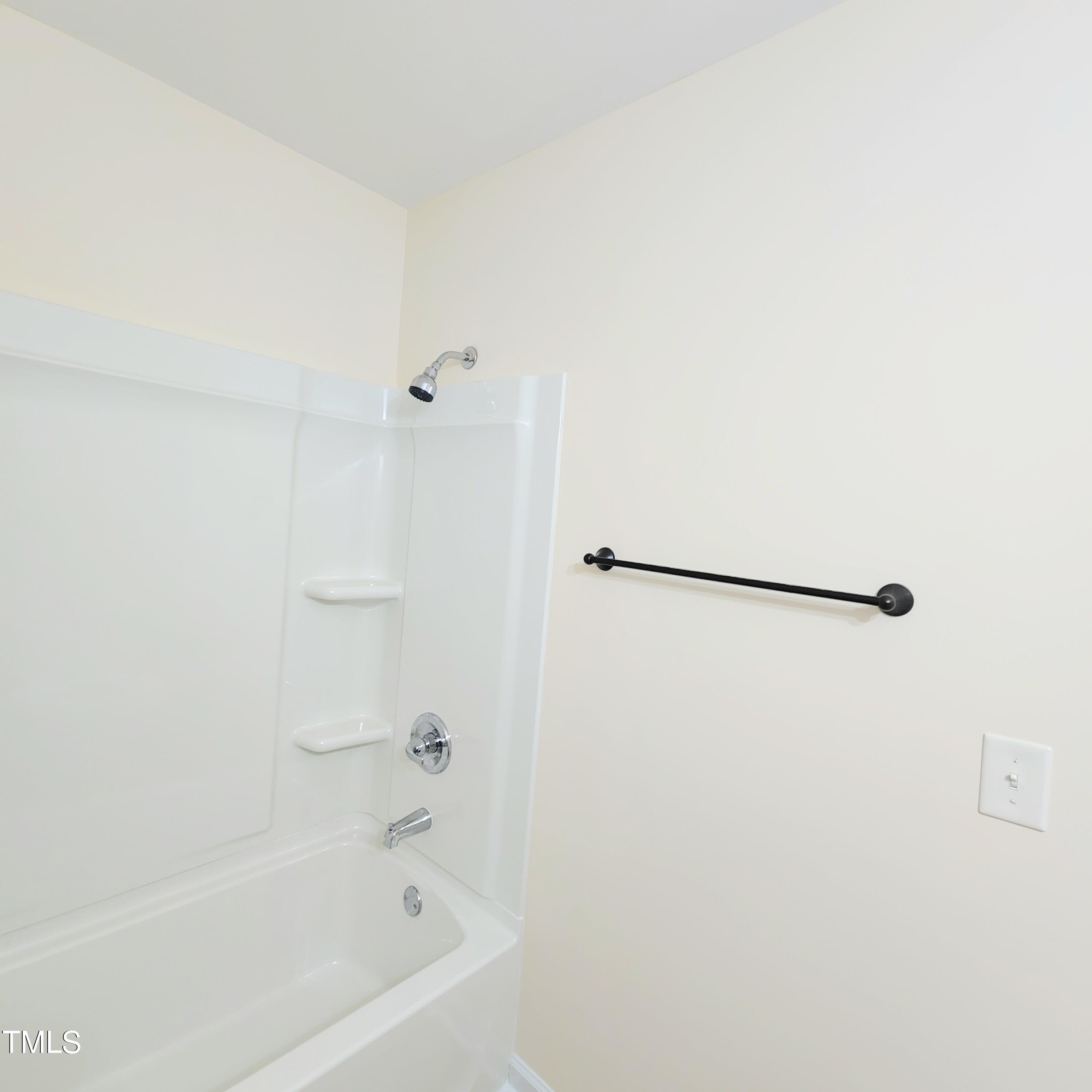 110 Sycamore Street Dunn, NC 28334 - Photo 14 of 28 a bathroom with a bathtub