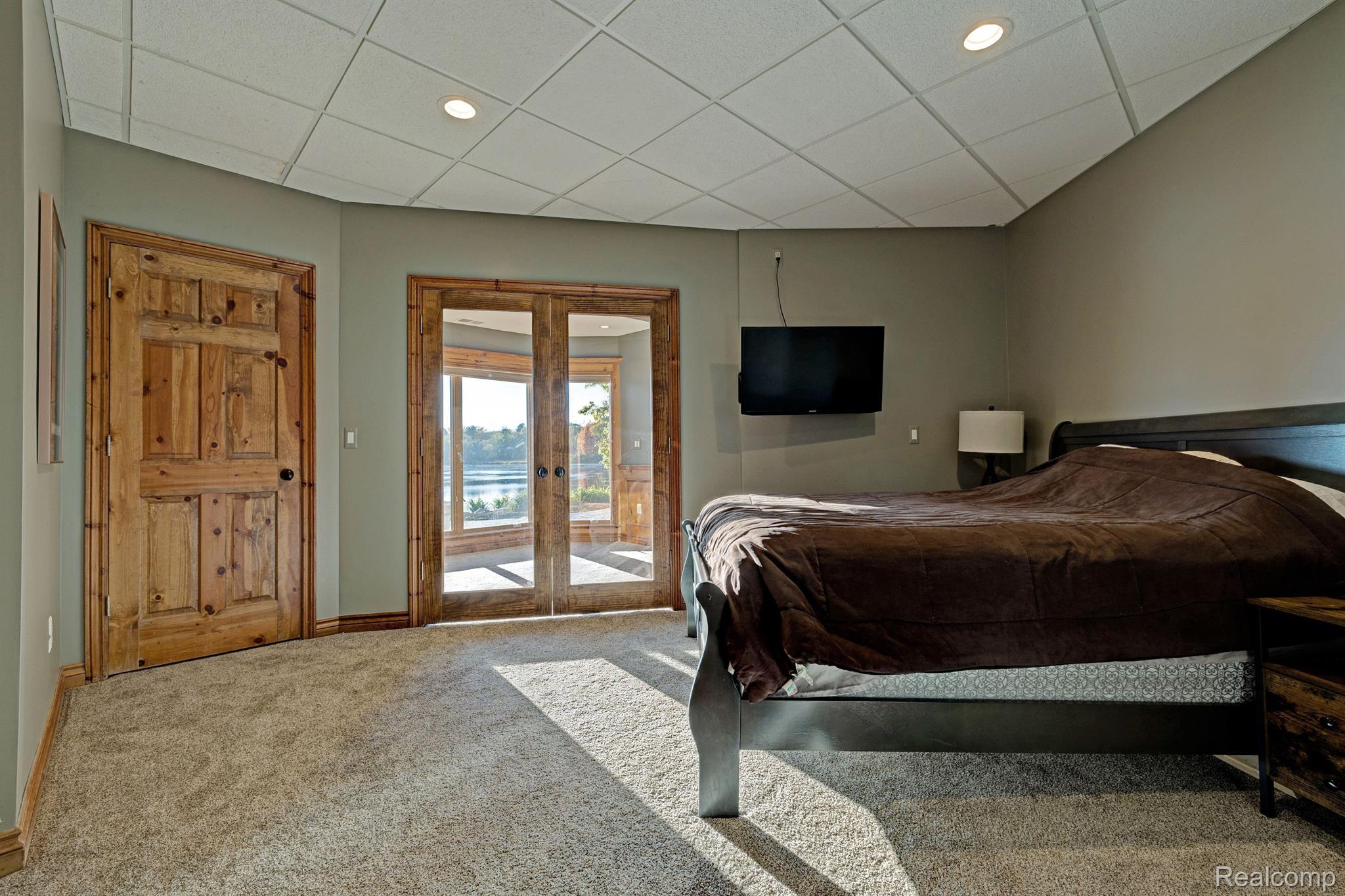 1372 McKail Road Leonard, MI 48367 - Photo 49 of 92 Basement bedroom