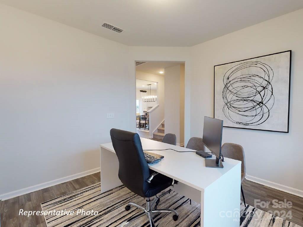 1207 Dan River Southwest, Unit 159 Concord, NC 28027 - Photo 7 of 13 a view of a workspace with furniture