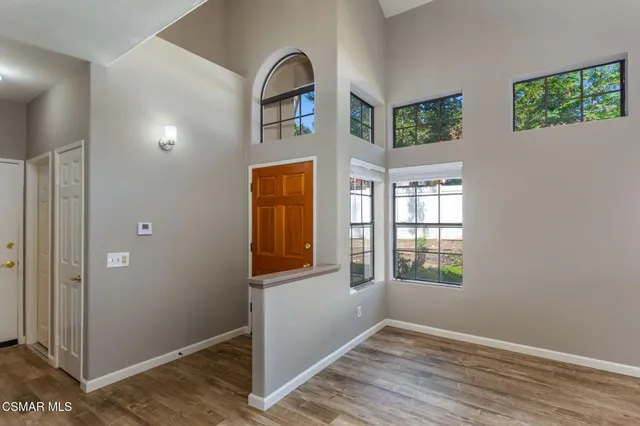 an empty room that has a window