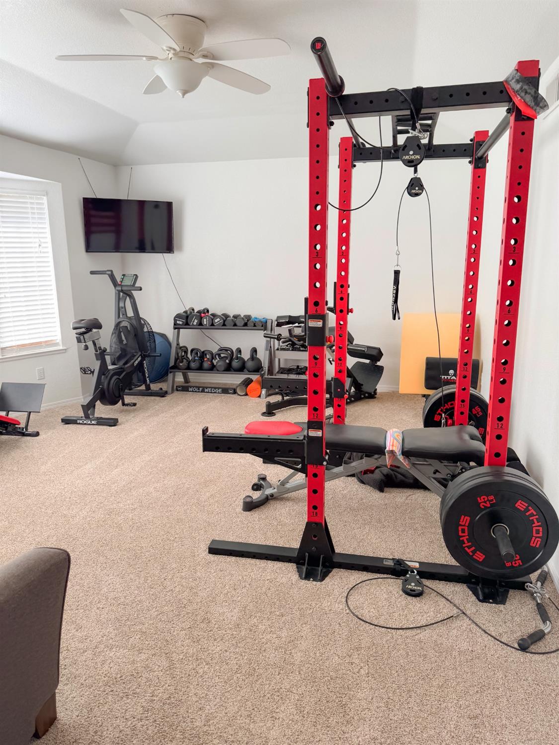 2544 Sterling Avenue Sanger, CA 93657 - Photo 14 of 27 a room with gym equipment and a mirror