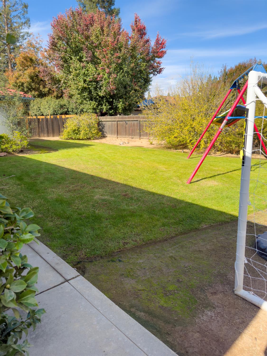 2544 Sterling Avenue Sanger, CA 93657 - Photo 23 of 27 a view of yard with swimming pool and seating