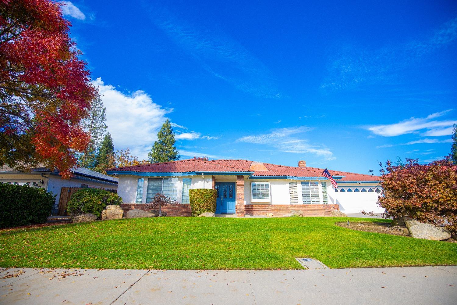 2544 Sterling Avenue Sanger, CA 93657 - Photo 3 of 27 a view of a yard in front of a house with a small yard