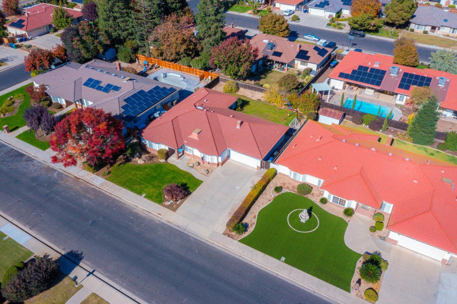 2544 Sterling Avenue Sanger, CA 93657 - Photo 6 of 27 an aerial view of a swimming pool patio and outdoor seating
