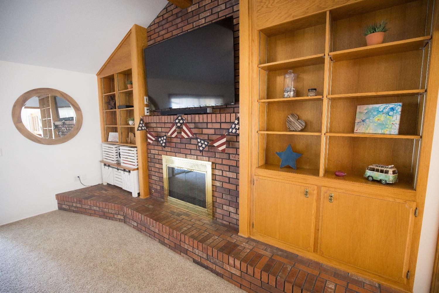 2544 Sterling Avenue Sanger, CA 93657 - Photo 8 of 27 a kitchen with a refrigerator and a stove