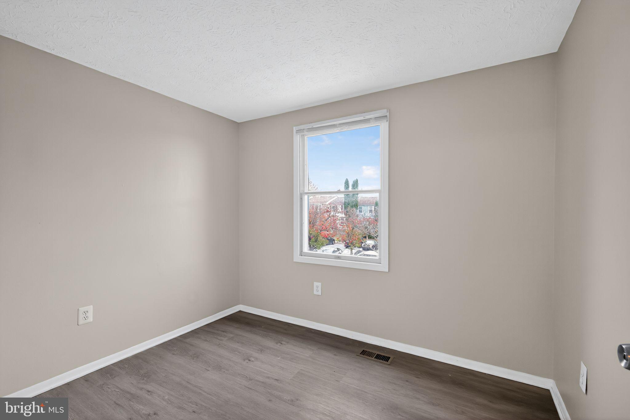 3602 Castle Terrace, Unit 116102 Silver Spring, MD 20904 - Photo 16 of 30 an empty room with a window