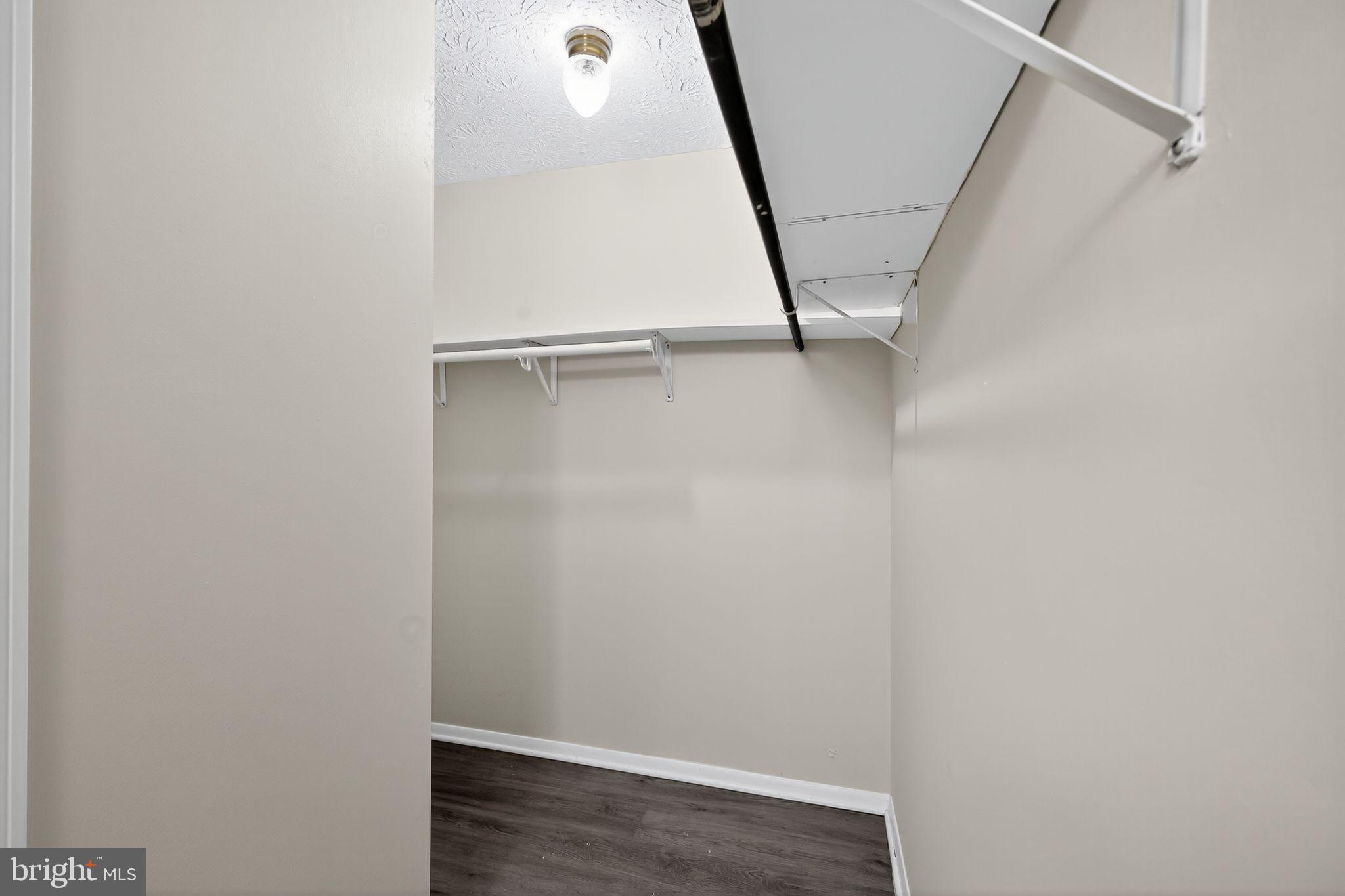 3602 Castle Terrace, Unit 116102 Silver Spring, MD 20904 - Photo 27 of 30 a view of an empty walk in closet