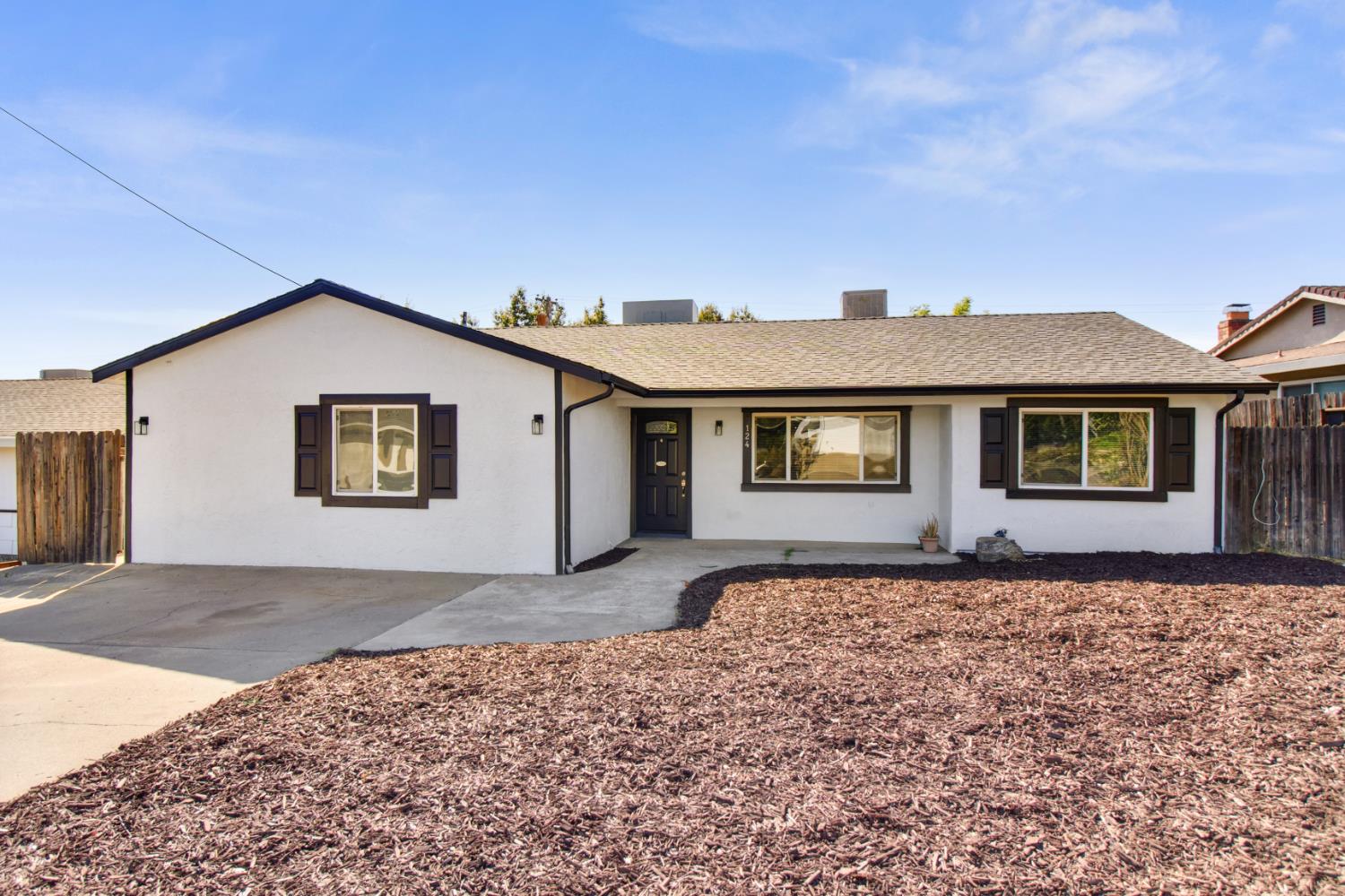 124 Fargo Way Folsom, CA 95630 - Photo 1 of 60 a front view of a house with a yard