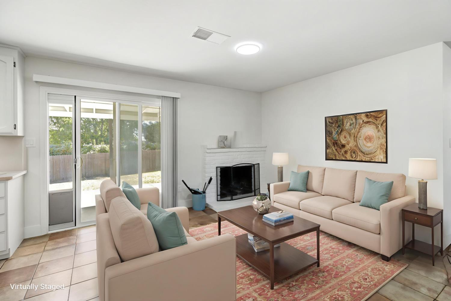 124 Fargo Way Folsom, CA 95630 - Photo 23 of 60 a living room with furniture and a fireplace