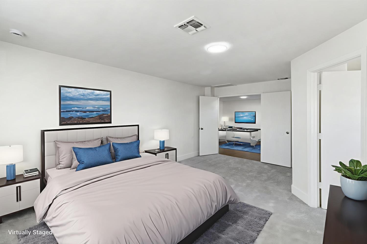 124 Fargo Way Folsom, CA 95630 - Photo 28 of 60 a spacious bedroom with a bed and a painting on the wall