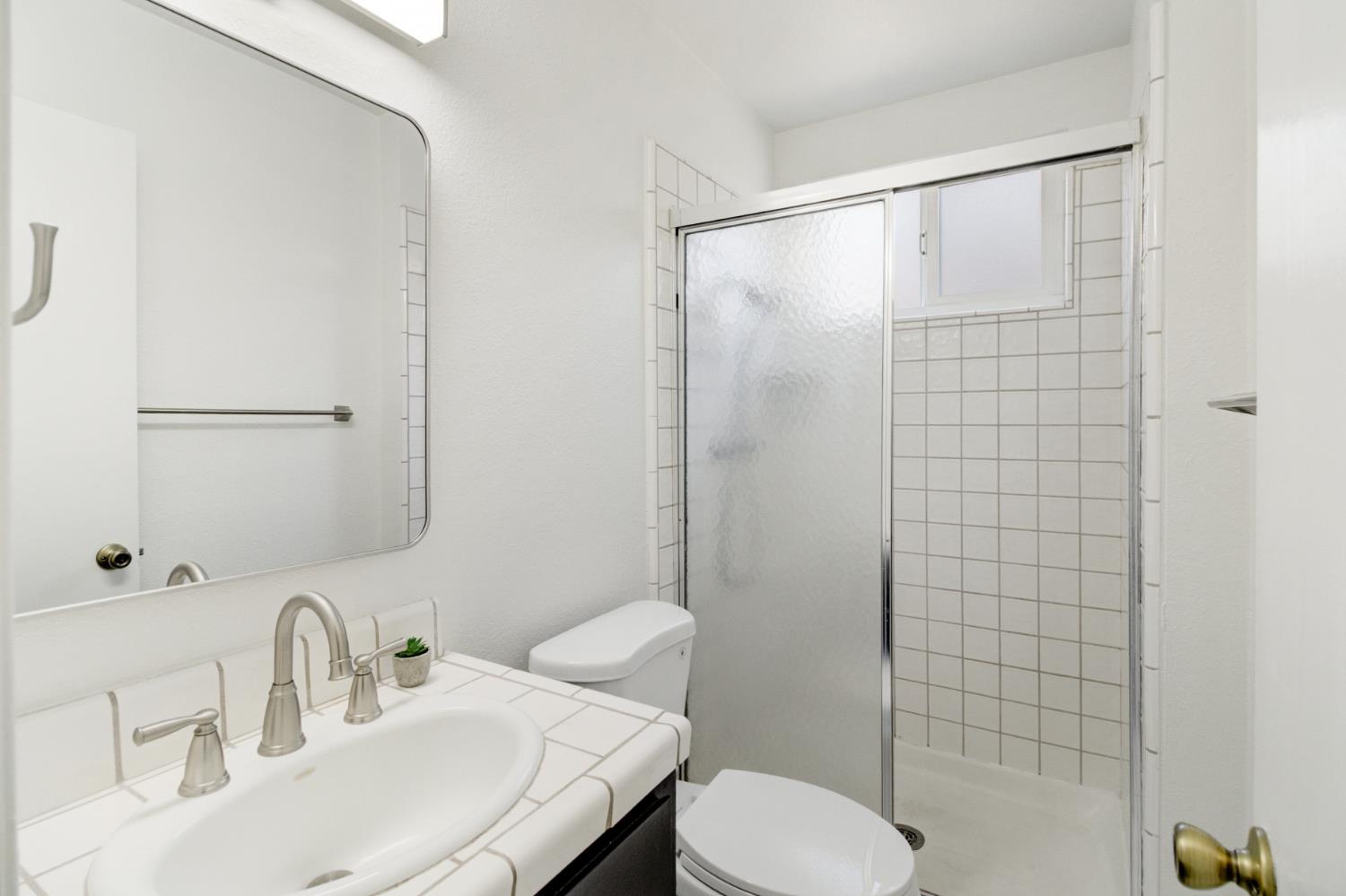 124 Fargo Way Folsom, CA 95630 - Photo 40 of 60 a bathroom with a sink toilet and shower