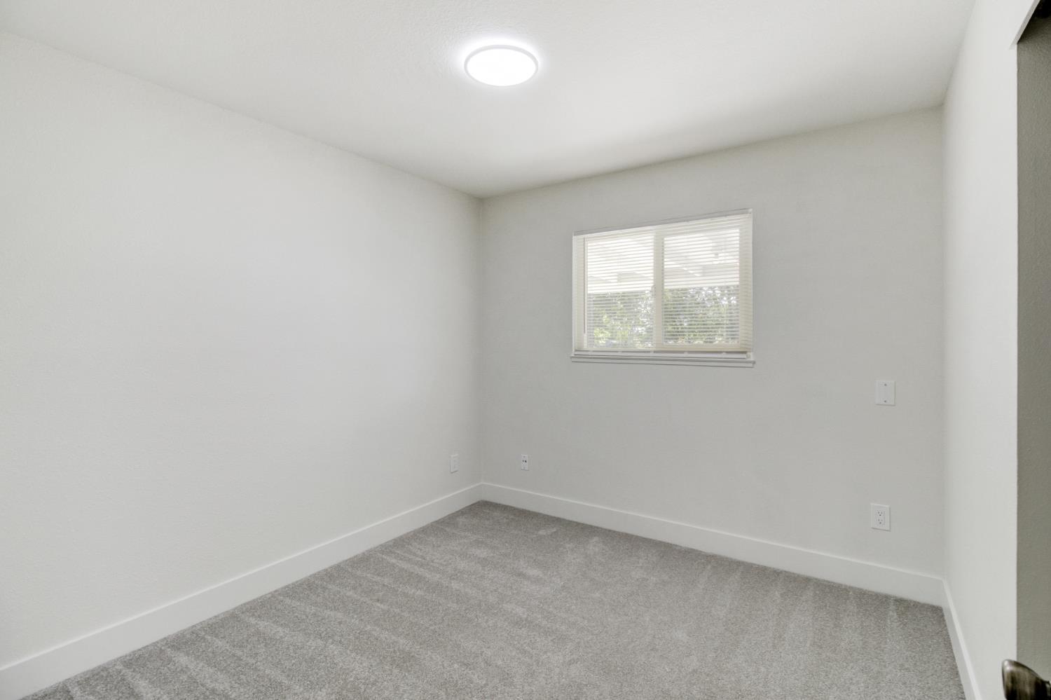 124 Fargo Way Folsom, CA 95630 - Photo 42 of 60 an empty room with a window