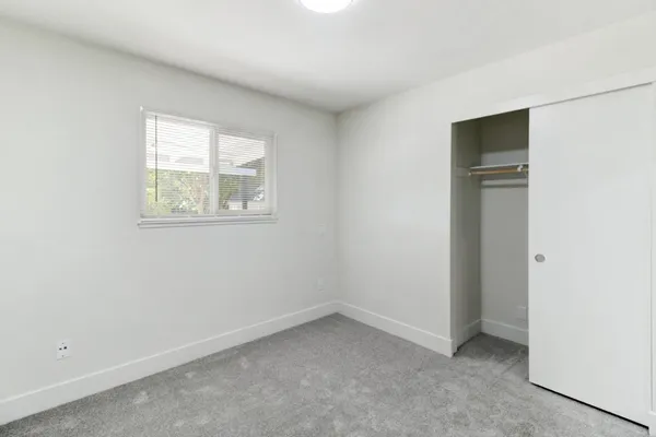 a outdoor space with patio the couches and dining table with garden view