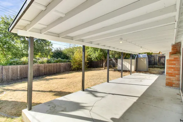 a house with trees in the background