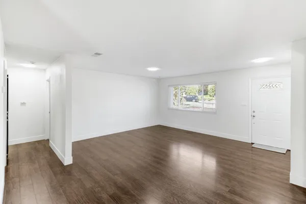 a view of livingroom with wooden floor