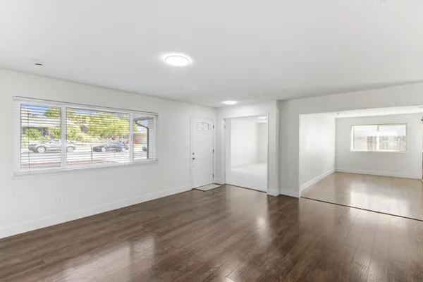 a view of entryway with wooden floor