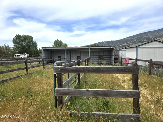 a view of swimming pool with outdoor seating