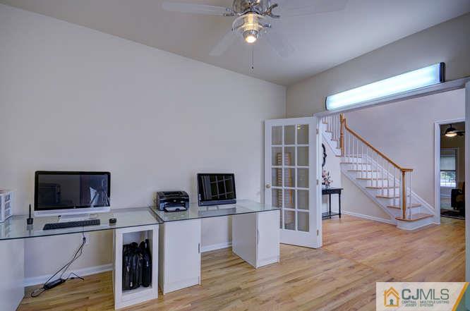 2 Banko Farm Road Dayton, NJ 08810 - Photo 5 of 24 a view of a livingroom with furniture and a flat screen tv