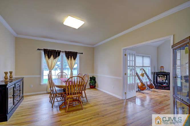 2 Banko Farm Road Dayton, NJ 08810 - Photo 6 of 24 a view of a dining room with furniture and wooden floor