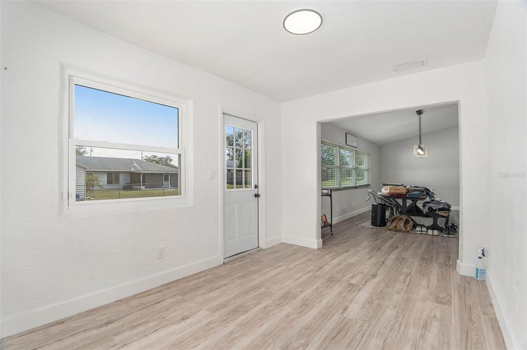 10234 Bedford Road Spring Hill, FL 34608 - Photo 17 of 31 a view of livingroom with furniture and bathroom